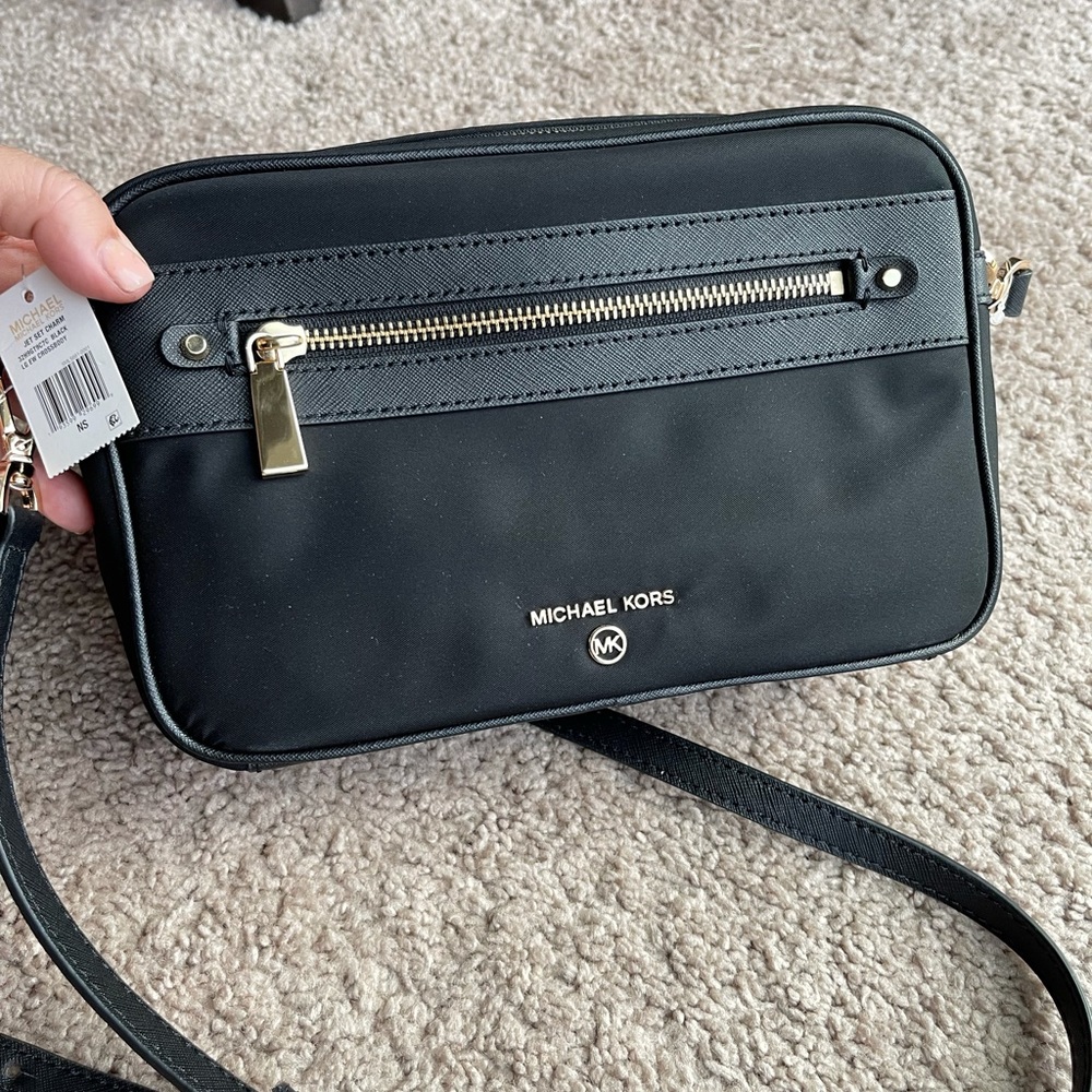 Michael Kors jet set charm east west crossbody Black. Brand new